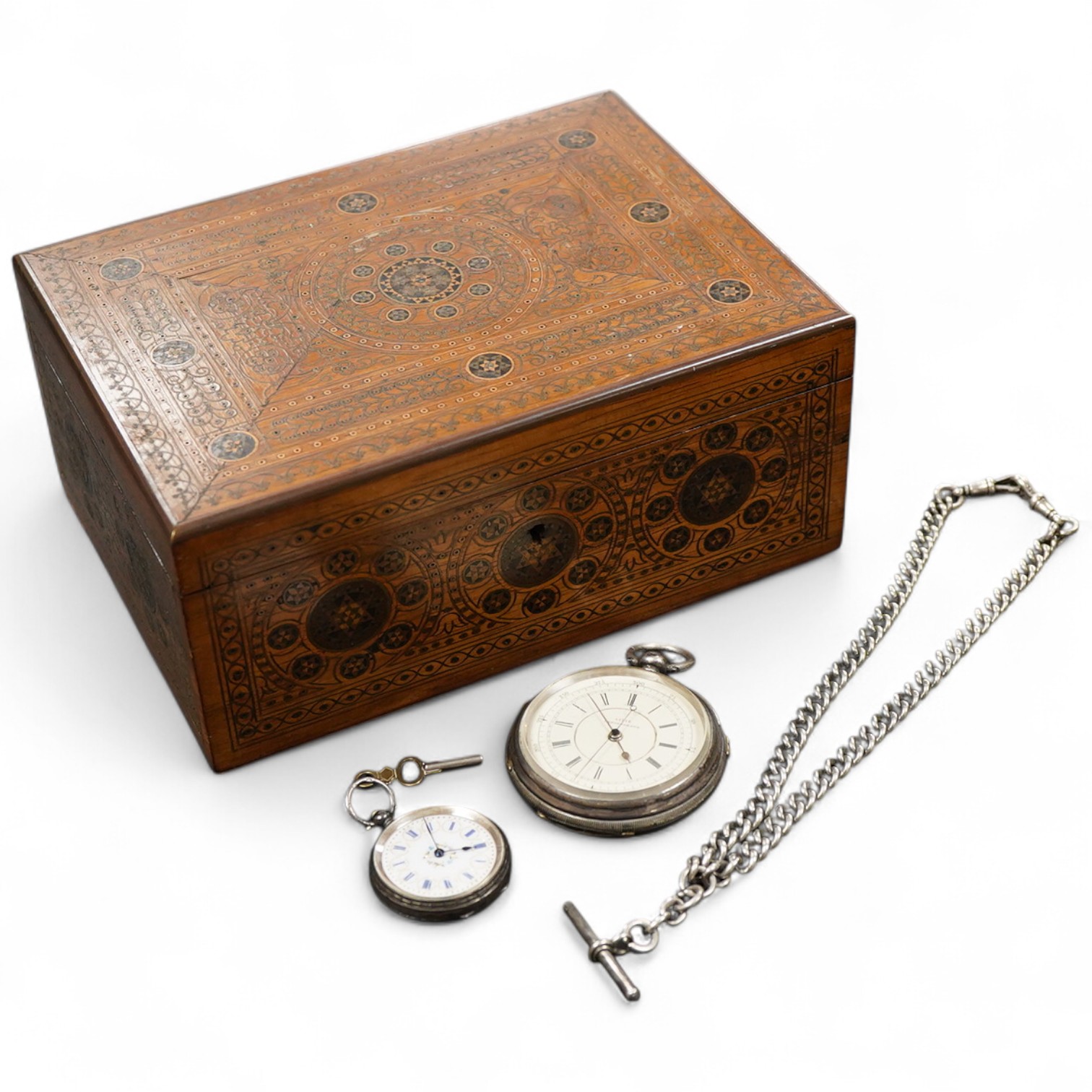 A late 19th century inlaid box containing a gentleman’s silver chronograph pocket watch, the dial numbered 41716, hallmarked for Chester 1878, a ladies Continental 935 grade silver pocket watch with enamel dial and a sil